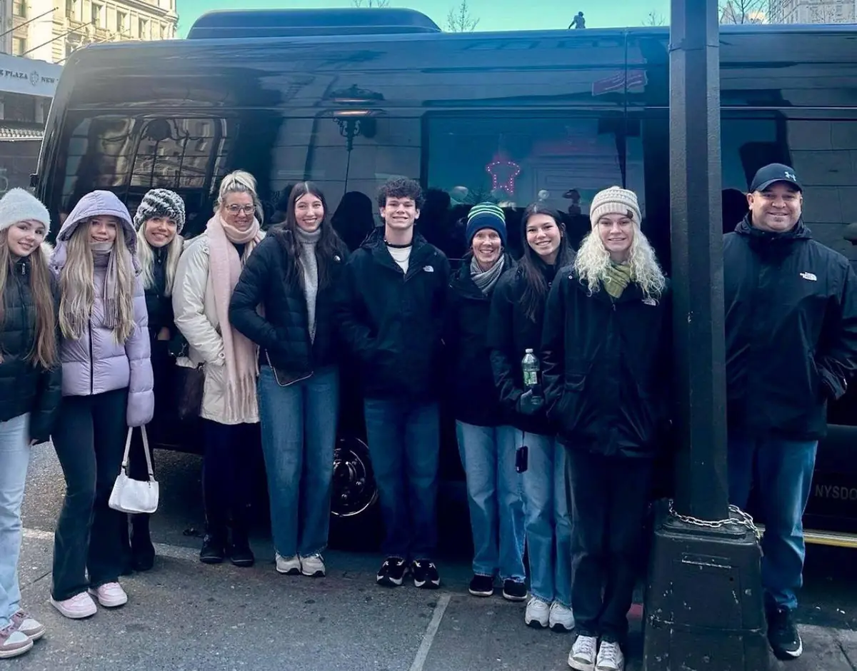 Private Gossip Girl bus tour group photographed at a Manhattan filming location