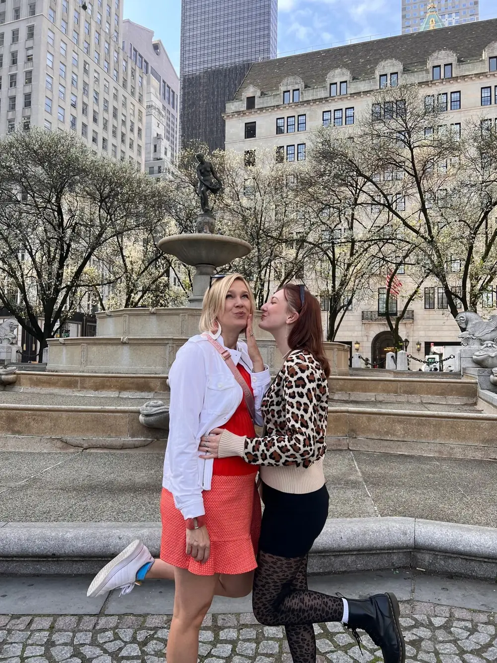 Guests at the Pulitzer Fountain in front of the Plaza Hotel on Fifth Avenue in New York City