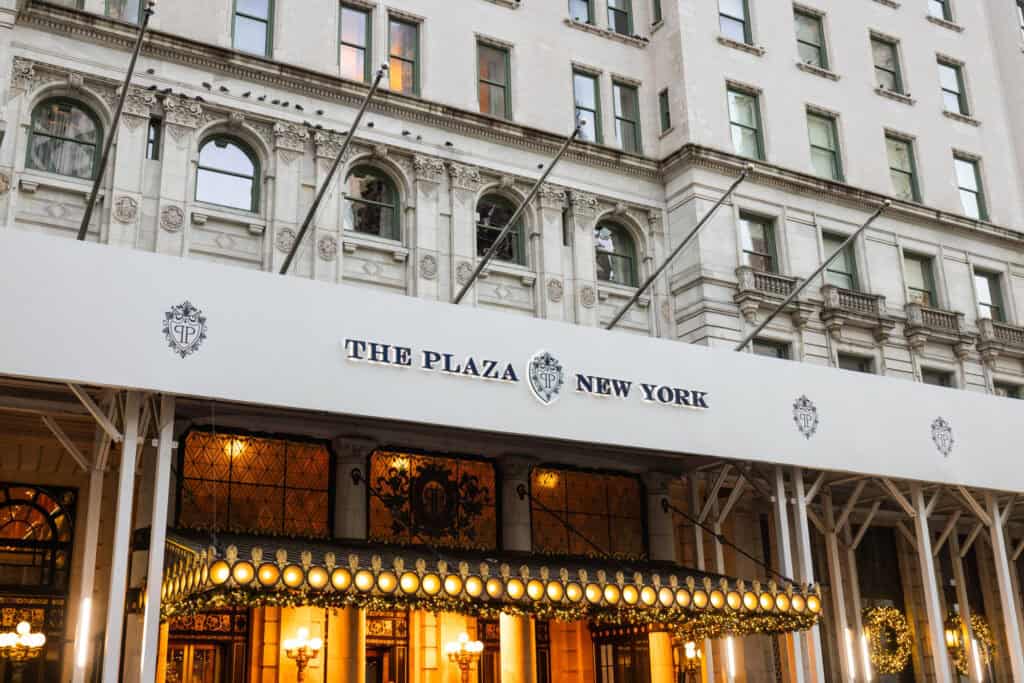 The Plaza New York canopy and Fifth Avenue entrance with gold lettering — Gossip Girl Tours location in Manhattan